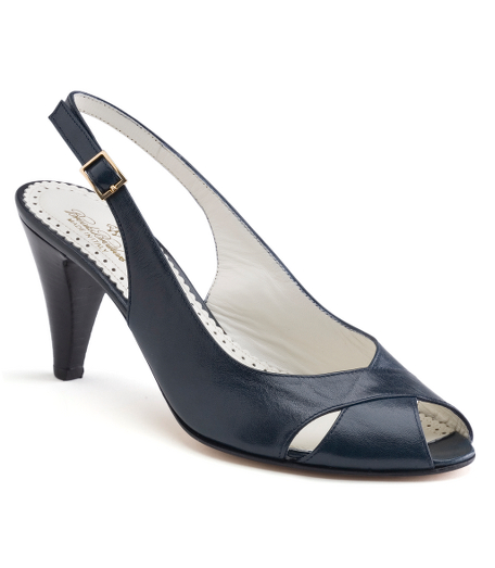 Leather. Leather lining and sole. 3 1/4" stacked heel. Made in Italy.