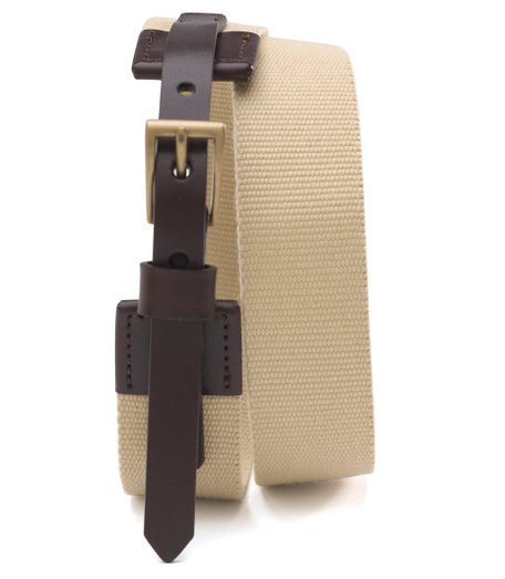 Cotton, canvas and leather. Brass buckle. 1 1/2" wide. Made in Italy.