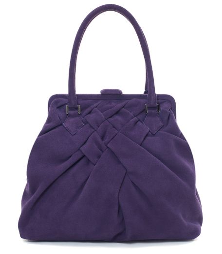 Suede. Shiny silver hardware. Lined with grey/black moire. Handbag has two inside open compartments and one inside zippered compartment. 14 1/4" x 12" x 4 1/2". Imported.