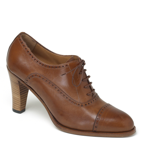 Genuine calfskin with leather lining and sole. Stacked 3" heel. Perforated captoe. Made in Italy.