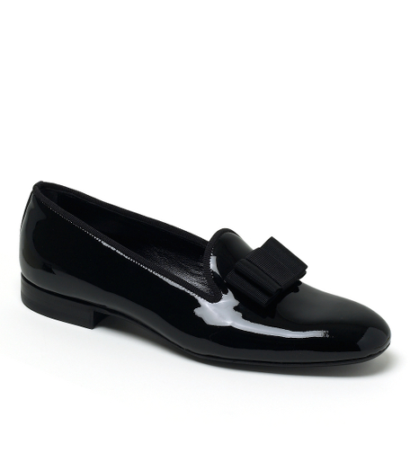 Patent leather. Leather lining and sole. Grosgrain ribbon. 1" heel. Made in Italy.