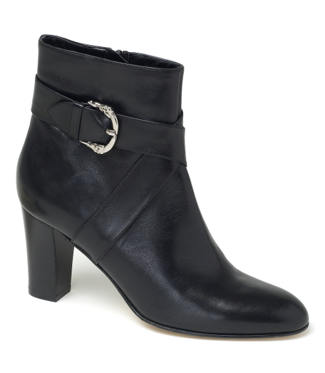 Genuine leather with horse buckle detail hardware. Leather lining and sole. 3" stacked heel. Side zipper. Made in Italy.