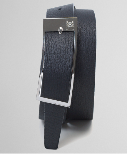 Genuine calfskin. Leather lined. Silver buckle. Tone-on-tone stitching. 1 1/2" width. Made in Italy.
