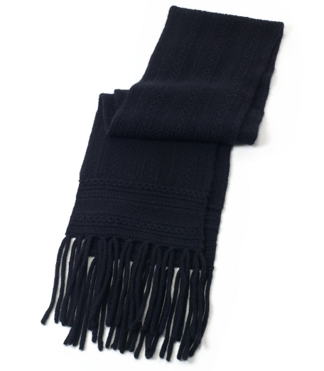 Soft wool and cashmere blend. Seed and cable stitch pattern. 60" x 8.5" plus 6" fringe. Dry clean. Imported.
