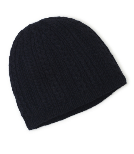 Soft wool and cashmere blend knit cap. Seed and cable stitch pattern. Dry clean. Imported.