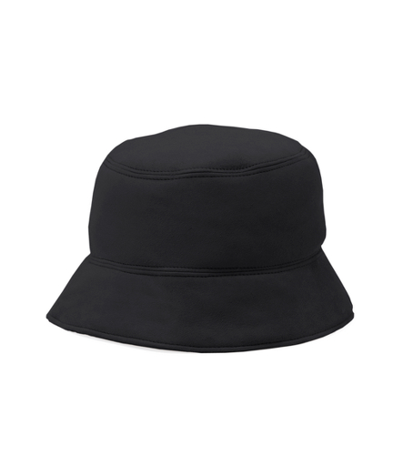 Genuine lambskin with a soft suede finish. Professionally clean. Imported.