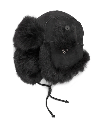 Genuine lambskin with Italian lamb fur trim. Soft suede finish. Toggle closure. Professionally clean. Imported.