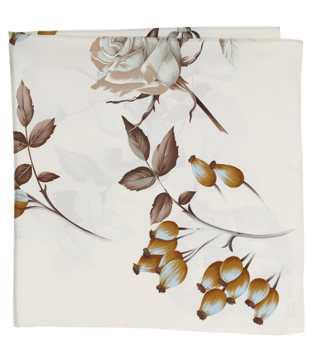 Pure silk twill. Beautiful rose design. 36" x 36". Presented in a gift box. Dry clean. Made in Italy.