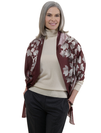 Silk and wool blend. Lightweight wrap with fall leaf pattern. 26" x 70" plus 1/2" side fringe. Dry clean. Imported.