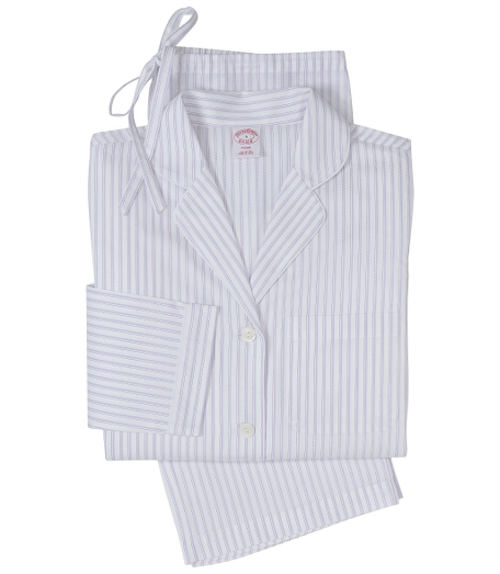Classic pajama comfortably styled in cotton broadcloth. Button front notch collar top with piping. Chest patch pocket. Bottoms have drawstring waist, half elastic back, clean front and locker loop. Presented in an organza travel bag embroidered with Brooks Brothers script logo. Machine wash. Imported.
