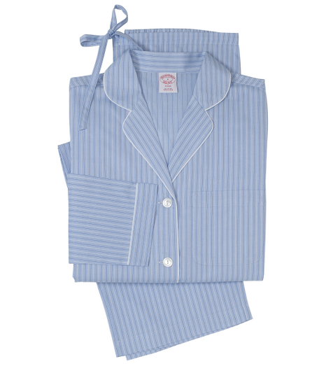 Classic pajama comfortably styled in cotton broadcloth. Button front notch collar top with piping. Chest patch pocket. Bottoms have drawstring waist, half elastic back, clean front and locker loop. Presented in an organza travel bag embroidered with Brooks Brothers script logo. Machine wash. Imported.