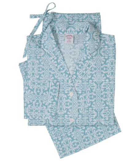 Classic pajamas comfortably styled with button-front notch collar top with piping. Chest patch pocket. Bottoms have drawstring waist, half-elastic back, clean front and locker loop. Presented in an organza travel bag embroidered with Brooks Brothers script. Machine wash. Imported.