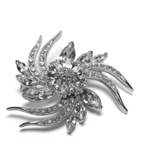Add an elegant finishing touch to your ensemble.Sterling silver pave crystal pin shaped like a flower with petals swirling from center. 2.25" diameter. Presented in a gift box. Imported.