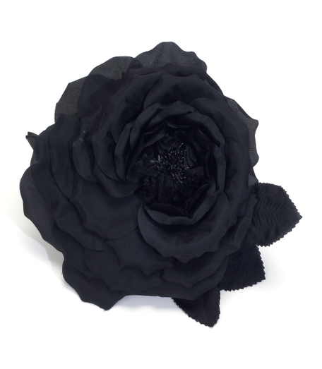 Polyester. Oversized rose pin. Can be used to decorate hats or apparel. 8" diameter. Made in Italy.