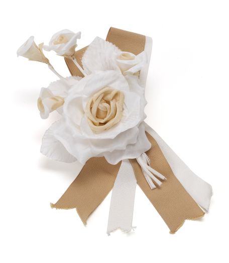 Silk. Tea rose and cala lily corsage pin. Can be used to decorate hats or apparel. 3" diameter with ribbon 10" long. Made in Italy.