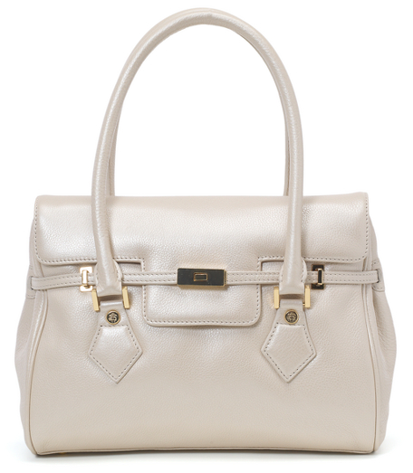 Leather. Gold hardware. Lined in beige moire. Interior zippered pocket, cell phone pocket and open pocket. Sliding lock and magnetic snap closure. 11" x 9" x 3". 6" from top of bag to top of handle. Imported.