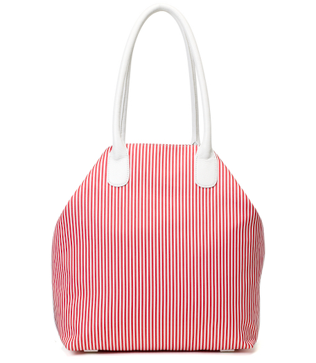 Cotton/polyester. Gold-toned hardware. Interior zippered pocket. Magnetic snap. Hanging pocket with credit card pocket. Tone-on-tone stitching. 14" x 11" x 5 1/2". 9" from top of bag to top of hand. Imported.
