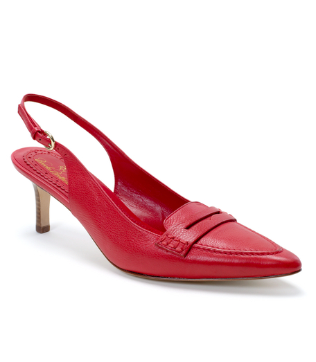 Leather with leather lining and sole. Gold-toned hardware. 2 1/2" heel height. Imported.
