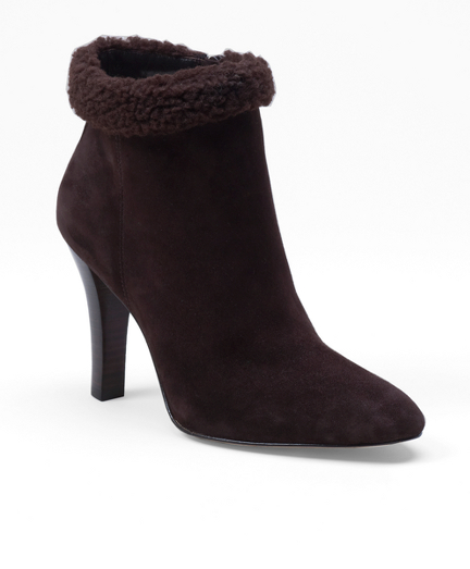Suede. Leather lining and sole. 3 3/4" stacked heel.  Gold-toned hardware. Imported.