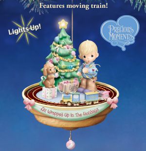 Click here to buy Precious Moments All Wrapped Up In The Holidays Illuminated... by The Bradford Editions.