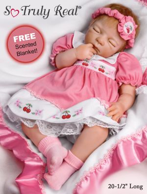 Click here to buy Cherry Blossom Collectible Lifelike Baby Girl Doll by The Ashton-Drake Galleries.