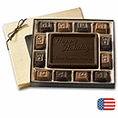Luscious solid chocolates in gold or silver gift box. Company name and/or greeting are molded on a 3 1/2 x 4 1/2  solid block. (Call for logos.) Gift box included. Choice of gold or silver gift box. Made in the USA