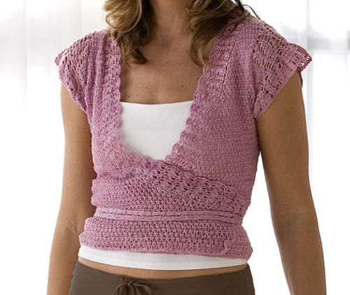 From a fair trade group

Light and airy for summer, this knitted cardigan is fair-trade-produced by a women's cooperative in Nepal. Hand-dyed cotton. Can be tied in the front, side or back. Close fi :  fair trade summer cardigan wrap cardigan gaiam