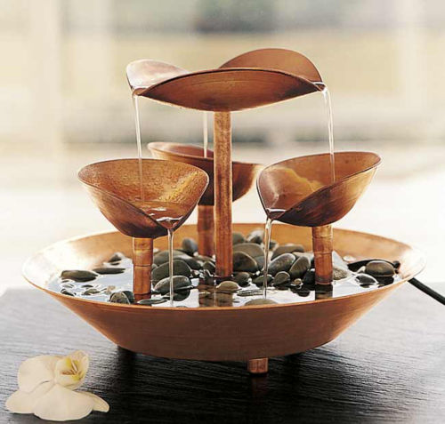 \#1 Bring the healing element of water into your environs with our handcrafted solid Copper Petals Fountain. Water is pumped through a curved petal-like centerpiece, pours into an elegant three-cup spiral