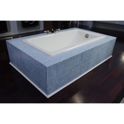 Shown is the Barbara Barry Cast Iron Bathtub in Stucco White with a Waste and Overflow in Chrome