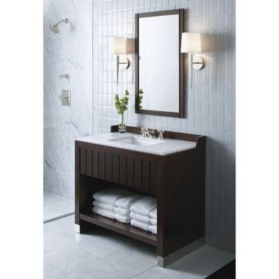 Shown is the Original For Him Dressing Table in Java with White Carrara Mable Top, Undercounter Basin in Stucco White, Tuxedo Showerhead and Trim and Basin Faucet For Him in Brushed Nickel
