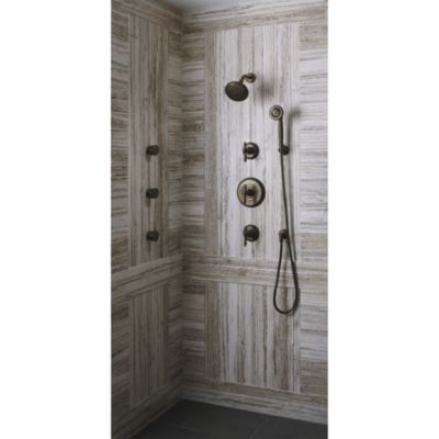 Shown is the Inigo Handshower and Hose, Inigo Wall Supply Elbow and Inigo Fixed Wall Bracket in Chrome