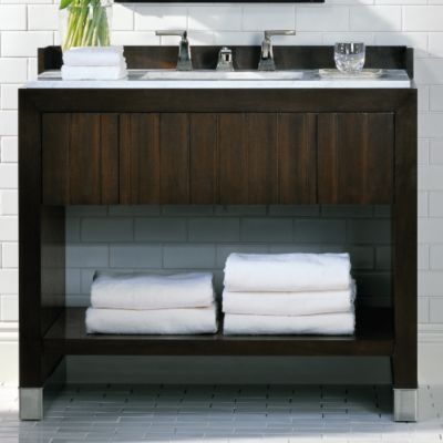 Shown is the Original For Him Dressing Table in Java with White Carrara Mable Top, Undercounter Basin in Stucco White, Tuxedo Showerhead and Trim and Basin Faucet For Him in Brushed Nickel