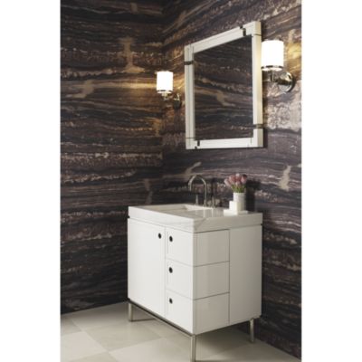 Shown is the Vir Stil 1.0 Vanity in White Lacquer; Pre-cut Top in Calacatta Borghini; Basin Set, Trim and Vanity Legs in Bronze