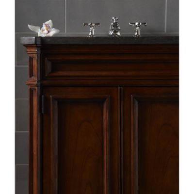 Shown is the Bellis Wood Vanity in Chestnut, with a Bellis Marble Top in Bleu De Chine, Citizen Small Undercounter Basin and Bellis Noble Basin Set with Cross Handles