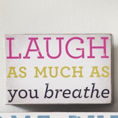 laugh as much as you breathe sign