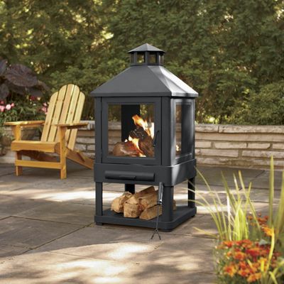Villa Firepit With Log Storage and Poker