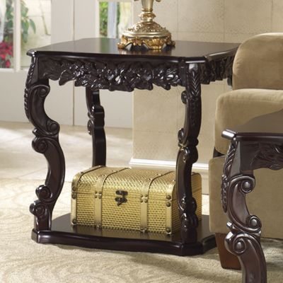 carved curved end table
