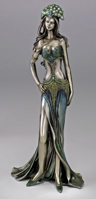bronzed figurine with peacock headdress