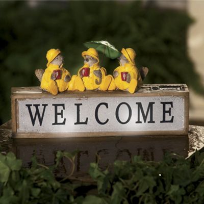 rain birds welcome sign