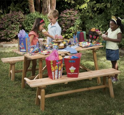 log cut pine picnic table and 2 benches