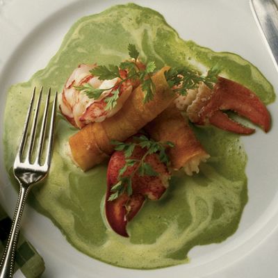 Lobster With Chive Brie Sauce And Asiago Cheese Potatoes