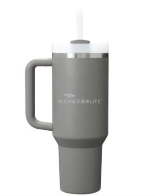 Stanley Quencher tumbler in 40 oz size, stone color, with handle, straw lid, and double-wall insulation.