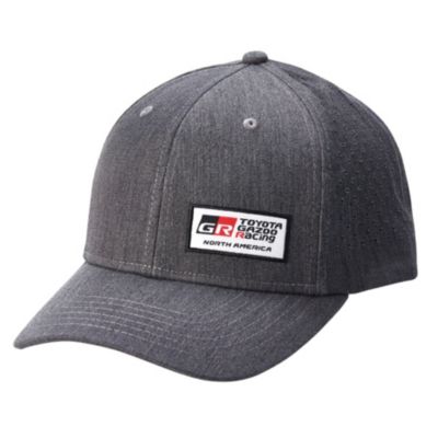 A gray baseball cap with a curved brim and six panels. The front of the cap features a rectangular patch with the text ""TOYOTA GAZOO RACING"" in black and red, followed by ""NORTH AMERICA""