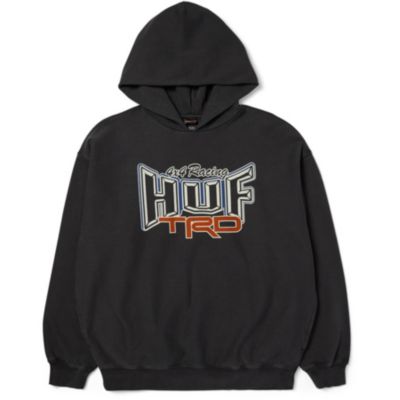 A black hoodie with a large front pocket and ""HUF TRD"" in bold letters on the chest.