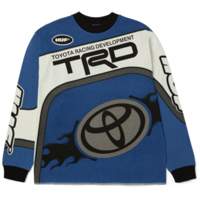 A blue and white long-sleeve shirt with the Toyota Racing Development (TRD) logo on the front, black cuffs and collar, and additional logos on the shoulders.