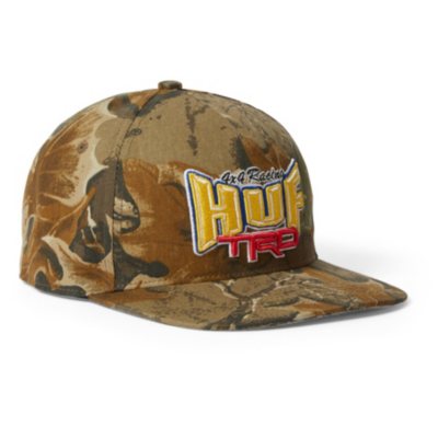 A camouflage cap with ""HUF TRD"" embroidered on the front.