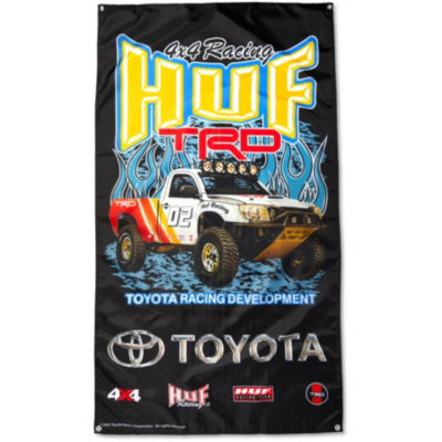 A vertical banner with a Toyota off-road racing truck, labeled ""08,"" and text ""HUF TRD"" and ""TOYOTA RACING DEVELOPMENT.""