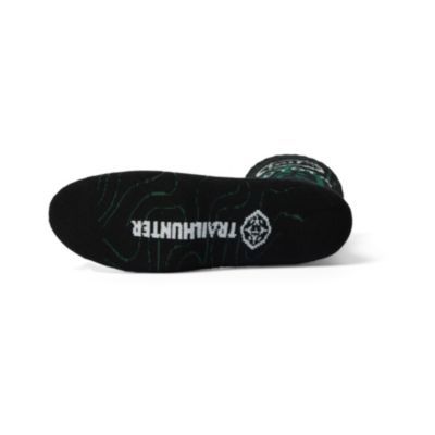 Black socks with green topography design knit into sock. Toyota in white.