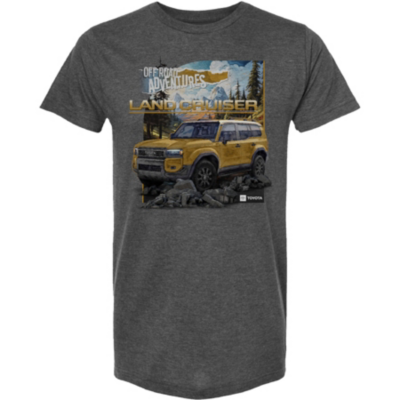 Dark gray T-shirt with a graphic of a yellow Land Rover Defender SUV driving over rocky terrain, with mountains, trees, and clouds in the background. 