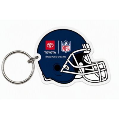 Keychain football helmet-shaped charm on a silver metal key ring. The helmet is dark blue with a white facemask. On the side a red-and-white Toyota logo and NFL branding.